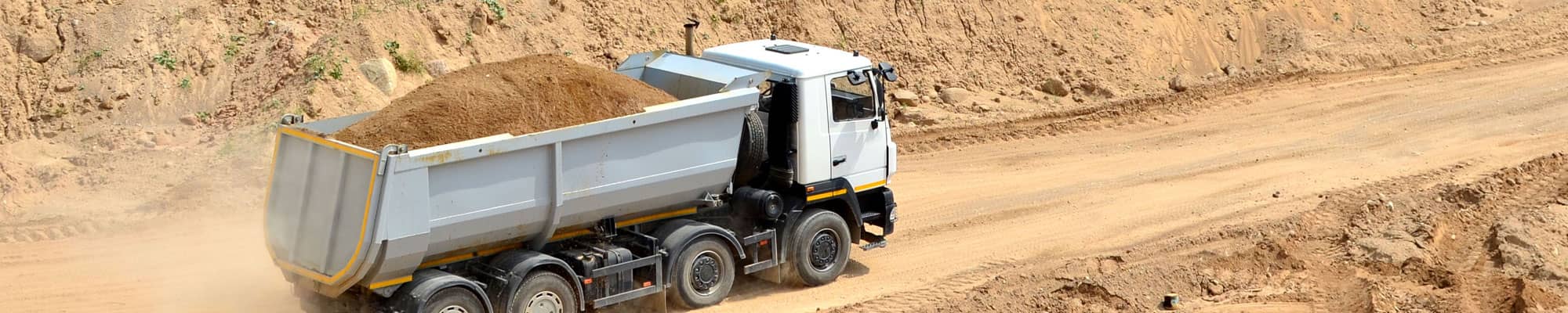 Lorry driving through quarry in North Wales